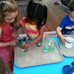 Eliana, Collin and Nerissa water pouring
