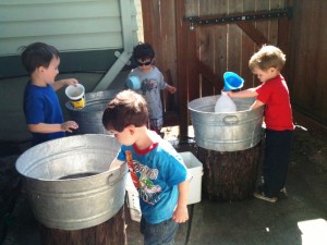 boys at the water buckets