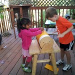 Nerissa and Cooper on the lathe