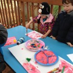Rock, Maddy, and Cam painting